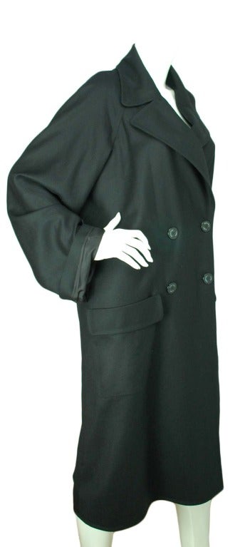 Chanel Black Oversized Trench Coat - sz.40
Age: 2012
Made In France
Composition: 100% Wool, 100% Silk Lining
Two Front Pockets
Black Chanel Buttons Reads: 