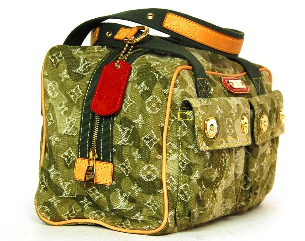 LOUIS VUITTON Green Denim Murakami 'Monogramoflage Lys' Tote Bag
c.2008
Made in France
Denim construction in shades of green camouflage.
Black canvas lining. 
Natural leather piping with cloth shoulder strap.
Features double strap tote bag in