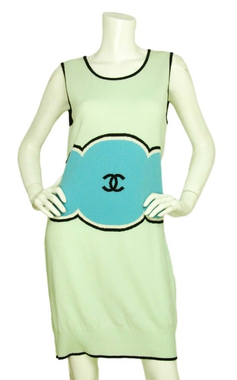 Chanel Two Tone Sweater Dress - Sz 42

Age: c. 2009
Made in Italy
Composition: 100% Cashmere
Mint green and sky blue w/black trim and CC logo
Labeled 