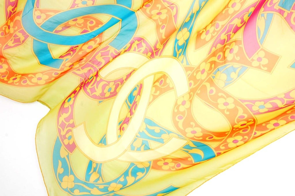 CHANEL Yellow, Orange & Blue CC Print Silk Chiffon Sheer Shawl/Scarf In Excellent Condition In New York, NY