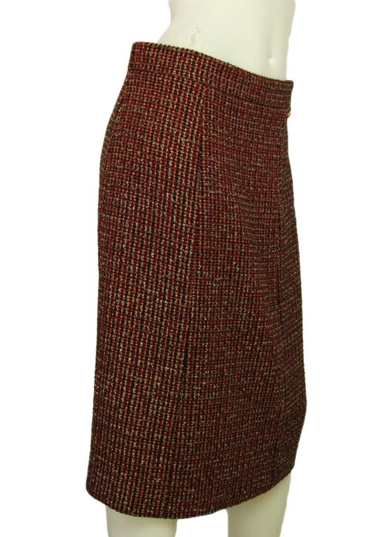 Chanel Red Tweed Pencil Skirt W/Metallic Threads - Sz 10

    Made in France
    Materials: 52% wool, 23% rayon, 18% polyester, 5% nylon, 2% rayon
    Back zipper closure
    Labeled 