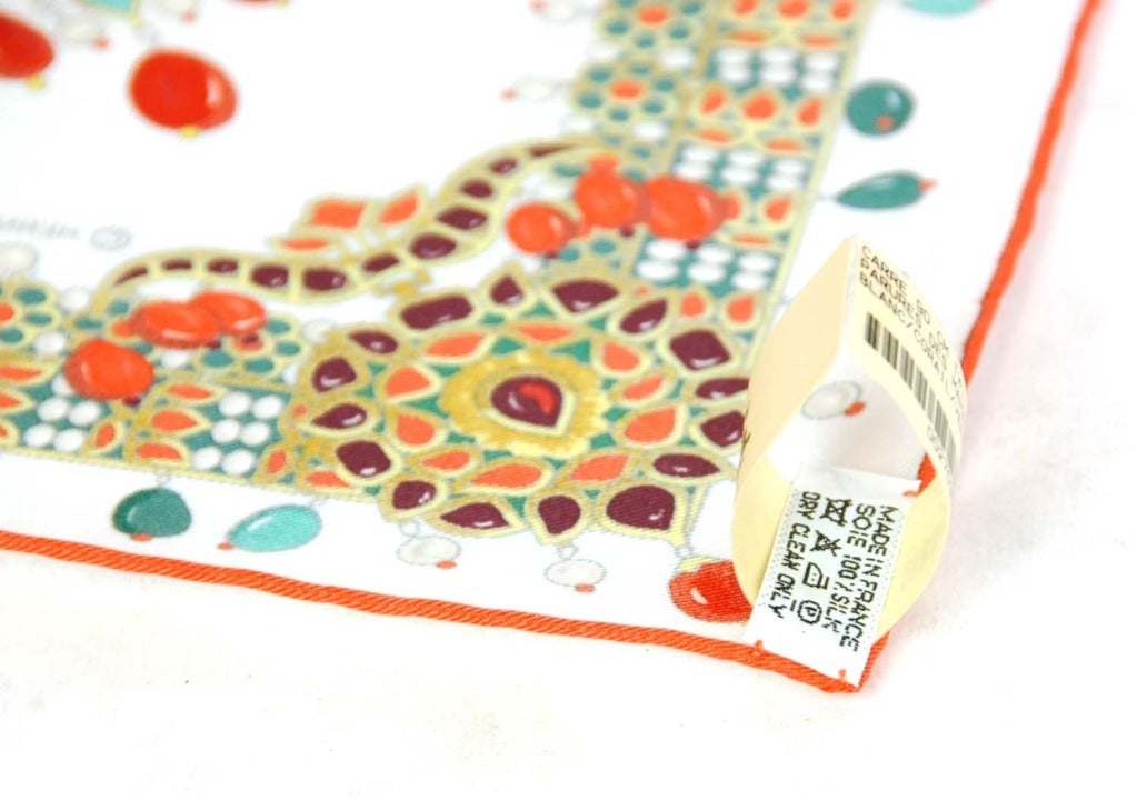 Hermes White PARURES DE MAHARAJAS Orange & Green Jeweled Scarf
Made in France
Materials: 100% silk
35