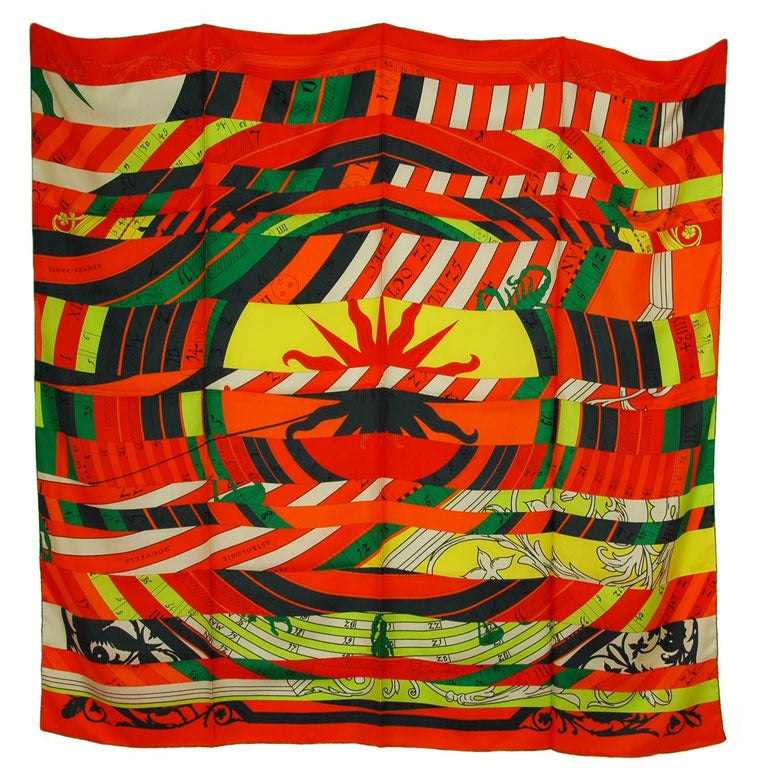 Hermes Multi-Colored Astrologie Nouvelle Giant 140cm Silk Shawl
This line is designed by Cyrille Diatkine

Made in: France
Color : Red, neon green, bright yellow, and black
Composition: 100% silk
Retail Price: $780 + tax
Overall Condition: Excellent