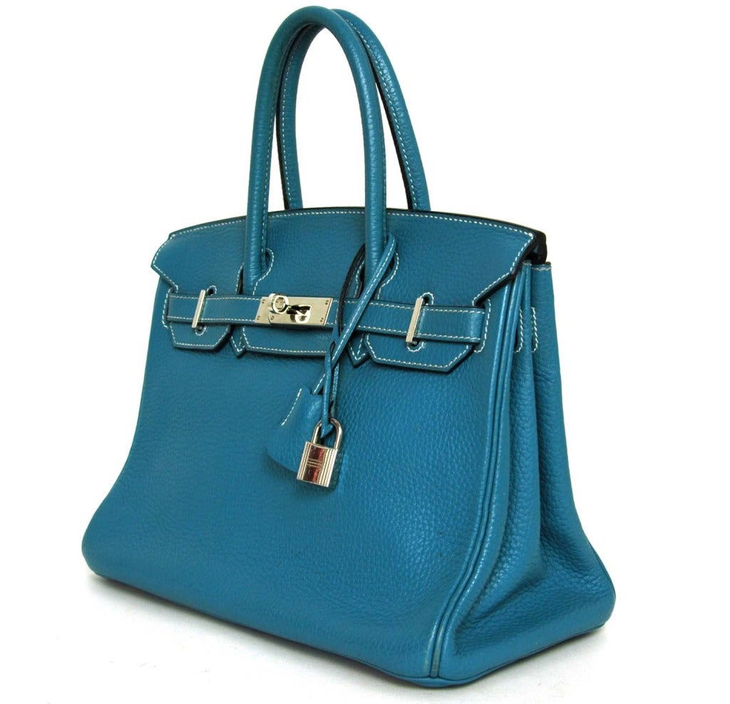 HERMES Togo Leather 30cm Blue Jean Birkin Bag With Palladium Hardware

.Age: 2005
Made In France.
Materials: Sky Blue Togo Leather, Palladium Hardware.
Features Double Top Handles, Crossover Straps With Classic Hermes Turnlock Closure, Dangling