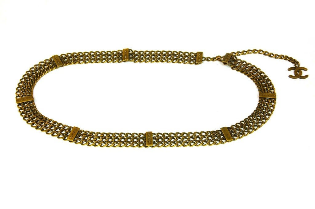 Chanel Bronze Chain Belt W/Dangling CC Charm

    Age: c. 1997
    Country manufactured: Unknown
    Materials: bronze metal
    Stamped 