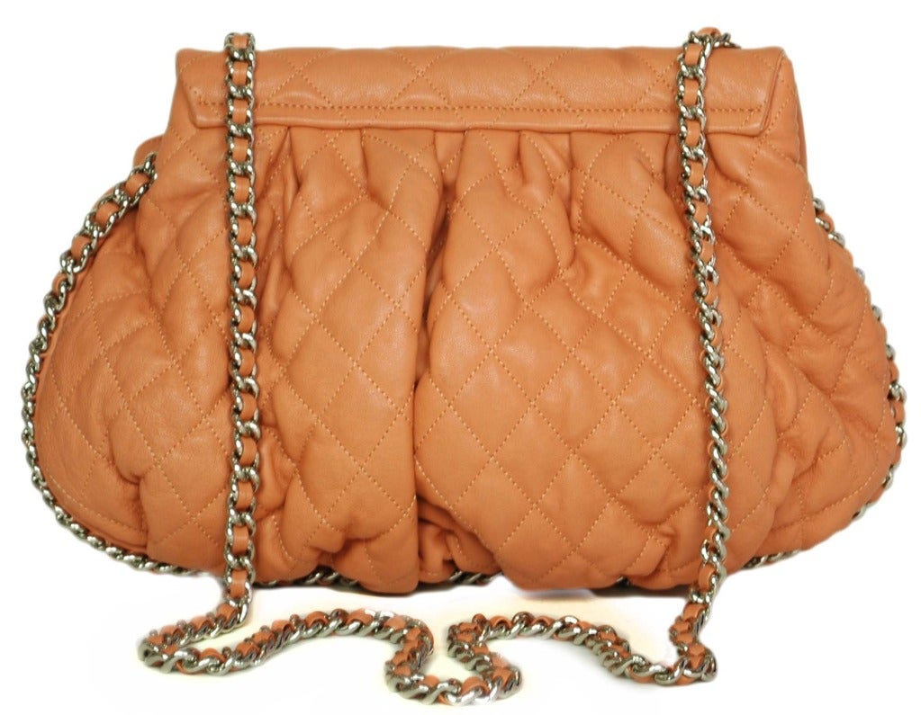 Chanel peach quilted 'Chain Around' Bag.
c.2012
Long 44
