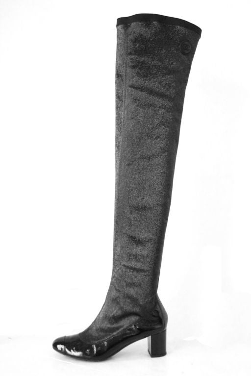 These stunning, sexy CHANEL Black Patent Thigh High Boots are the must-have for the season.<br />
<br />
The boots measures 27.5