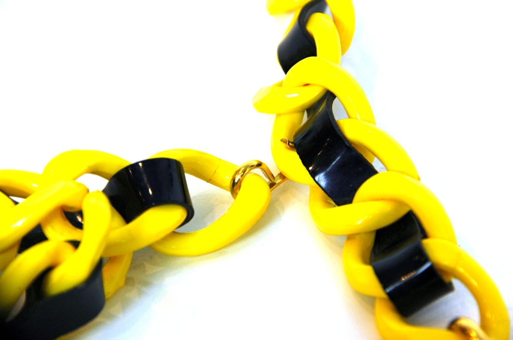 Chanel Black/Yellow Resin And Patent Link Chain Belt

    Age: c. 1994
    Made in France
    Materials: resin, patent leather
    Hook closure with hanging CC
    Stamped 