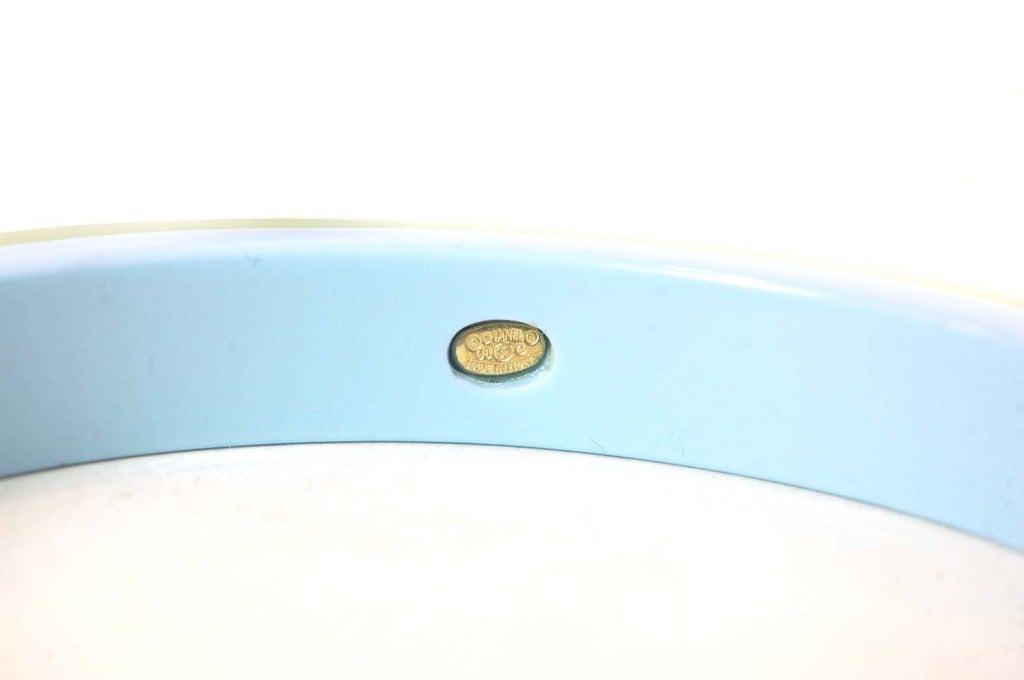 CHANEL Narrow Blue Resin Bangle With Logo CC's & Stones c. 2008 In Excellent Condition In New York, NY