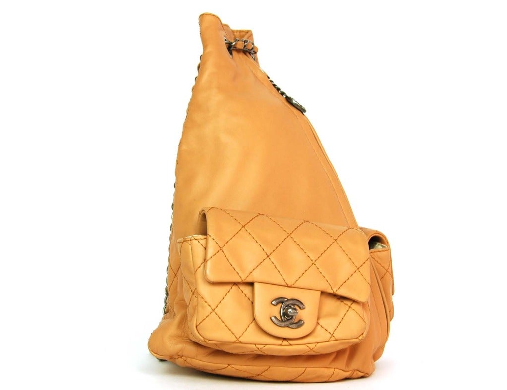 Age: 2013
Made in Italy
Materials: leather, cotton blend lining, silver hardware.
Features camel leather with peachy undertones and antique silver hardware. Pear shaped bag with two signature quilted pockets with twist lock CC closures. Center