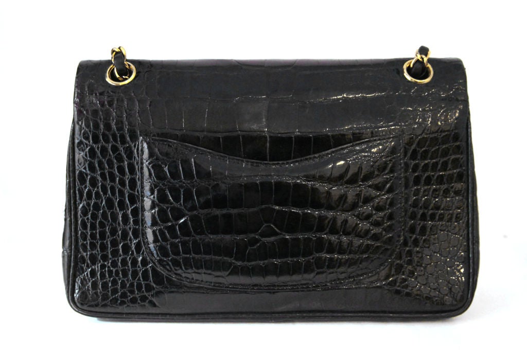This stunning vintage 90's CHANEL Black Crocodile 10