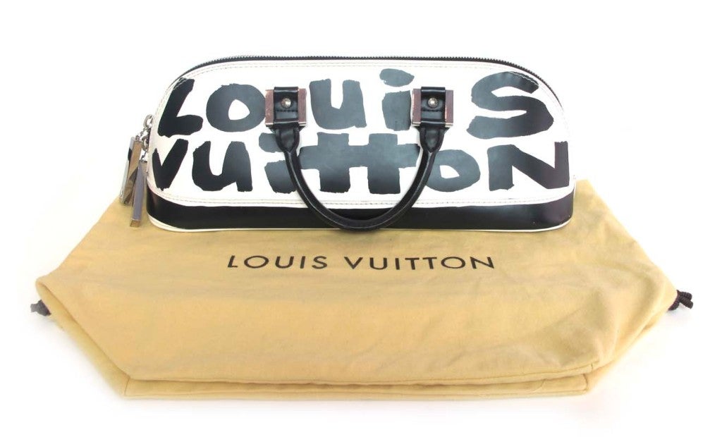 LOUIS VUITTON Black/White Canvas Long "ALMA" Bag at 1stDibs
