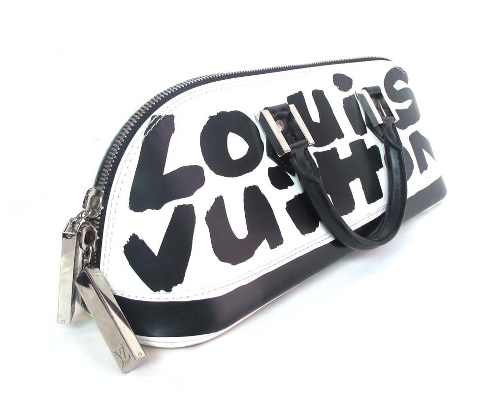 LOUIS VUITTON Black/White Canvas Long "ALMA" Bag at 1stdibs
