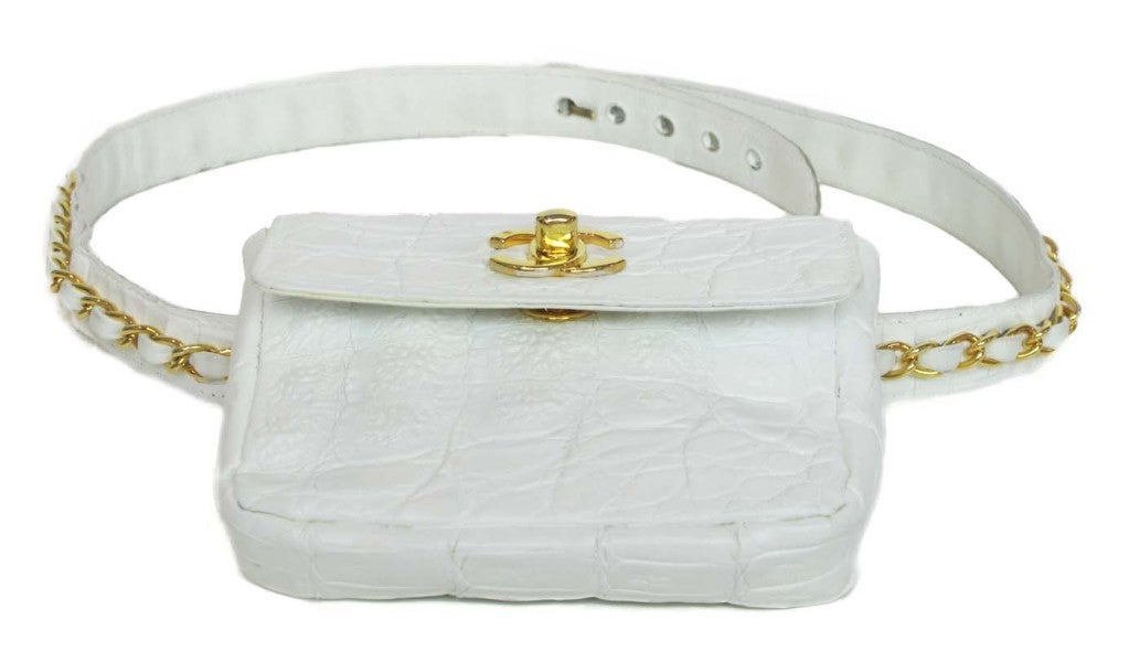 Chanel White Crocodile Leather Belt Bag With Gold Hardware
Age: 80's
Made In Italy
Materials: Crocodile Leather
Stamped: 