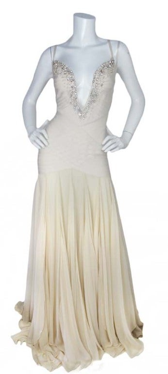 Herve Leger Cream Gown With Crystal Top
Materials: 90% Rayon, 9% Nylon, 1% Spandex, 100% Silk Skirt
Made In China
Marked Size Small

Measurements: 

Bust: 28