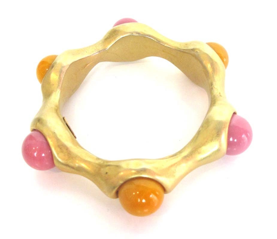 Chanel Gold Bangle With Pink & Orange Balls
Age: 1993
Made In France
Stamped: 
