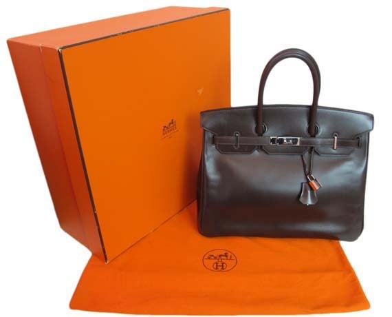 Hermes Brown Leather Birkin With Palladium Hardware - 35cm.



Age: 2006

Made In France

Materials: Leather

Stamped With: 