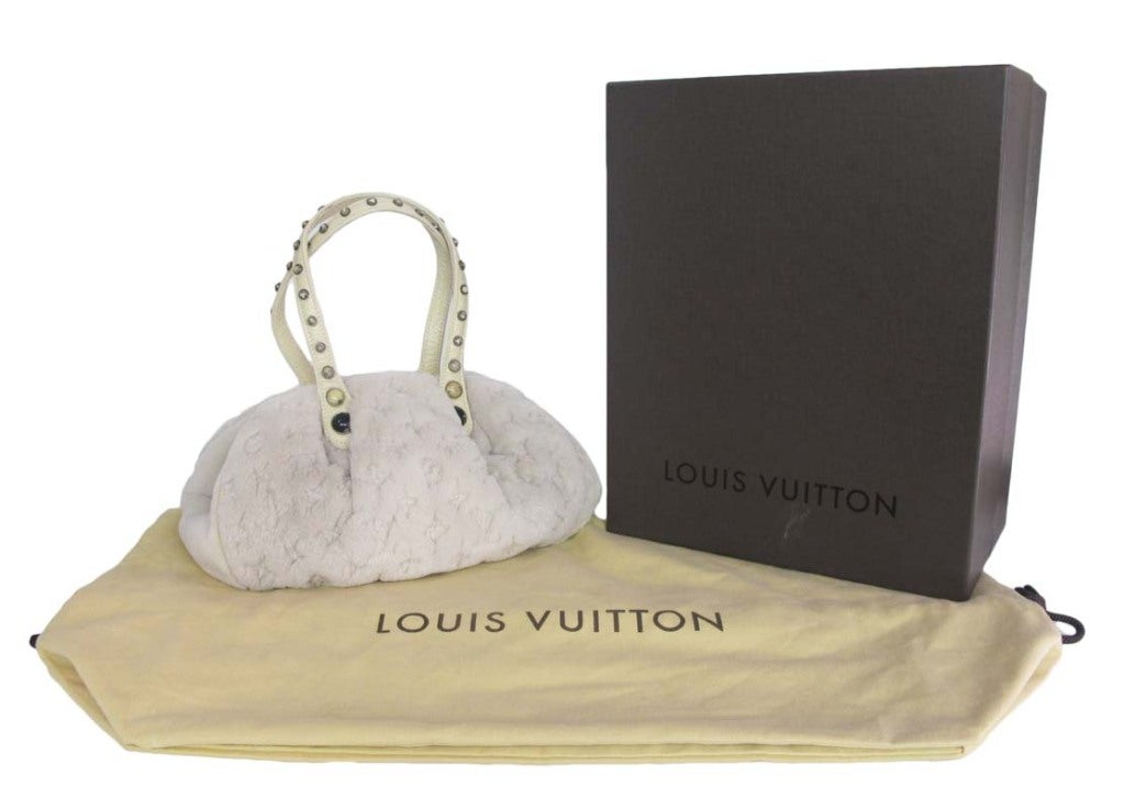 Louis Vuitton Cream Sheared Mink Handbag With Leather Handles & Stones RT - $6,550
 Age: 2005
 Made In France
 Materials: Mink, Cow Leather Trim, Textile Lining
 Stamped: 