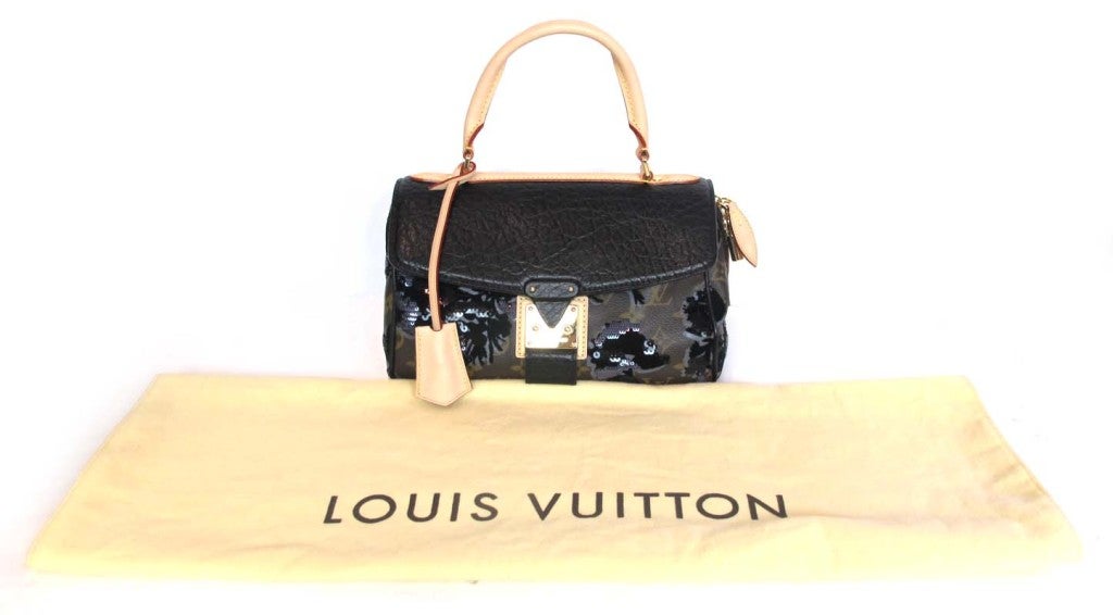 Louis Vuitton Monogram Fleur De Jais Sequin Handbag
Age: 2010
Made In France
Materials: Canvas, Calf Leather, Sequins
Stamped: 