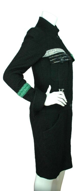Chanel Black Tweed Wool Coat With Belt
Age: 2009
Made in France
Composition: 73% Wool, 8% Silk, 7% Arcylic, 4% Mohair, 3% Alpaca, 2% Nylon, 2% Polyester, 1% Rayon, 100% Silk Lining
Features Green & White Trims
Comes With Optional, Detachable