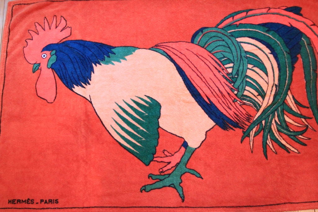 Get ready for summer with this fantastic HERMES cotton beach towel!  Featuring rich colors and a bold print.  A unique rooster design at its center with notes of blue, green and red on an classic Hermes orange background.  Hermes-Paris printed on