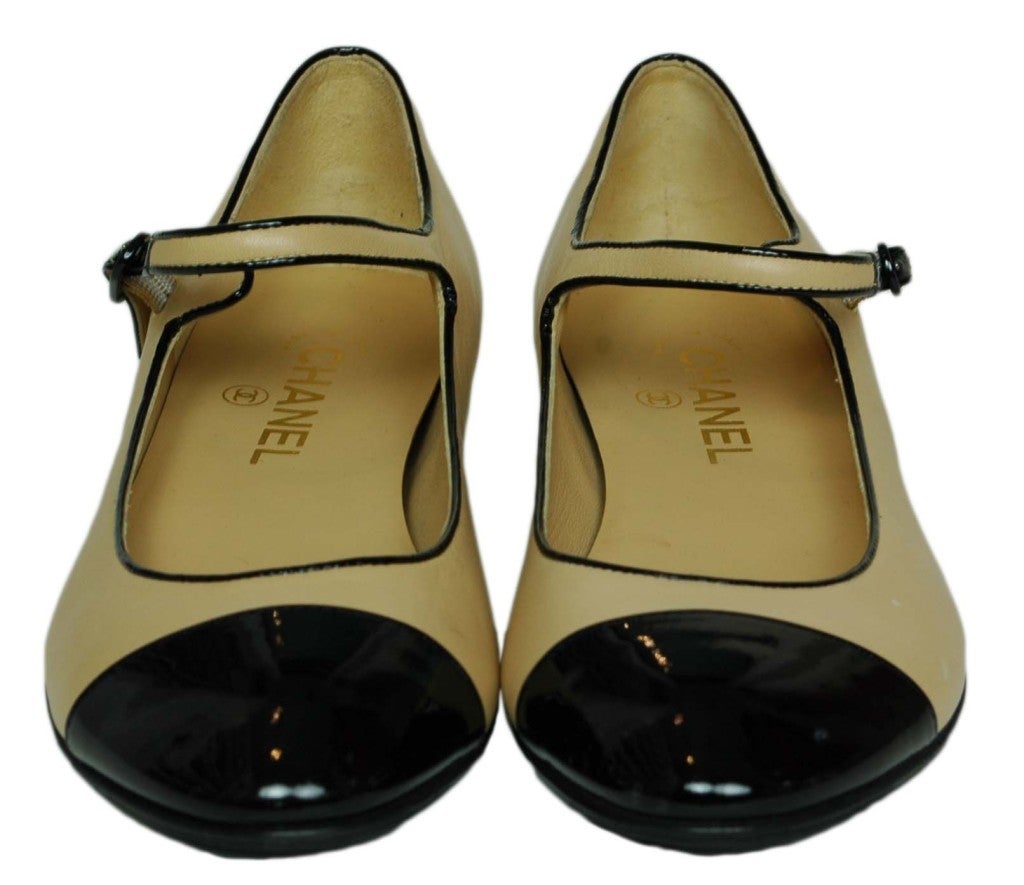 Chanel Tan/Black Mary Jane Flats with Patent Toe
Age: N/A
Made In Italy
Materials: Leather/Patent Leather
Authentication Numbers Read: 