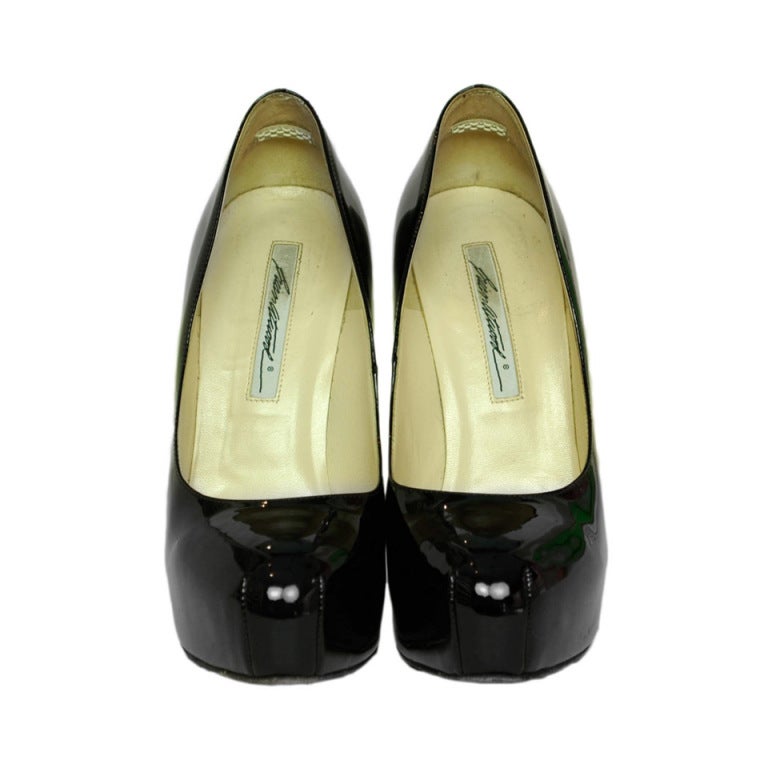 Brian Atwood Black Patent Hiidden Platform Shoes
Made In Italy
Materials: Patent Leather
Retail: $595

Measurements:
Insole: 8.5
