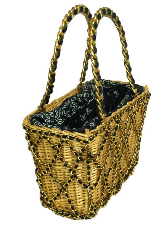 Chanel Wooden Picnic Basket
Age: 1991-1994
Made In France
Materials: Wood, Woven Chain
Stamped: 