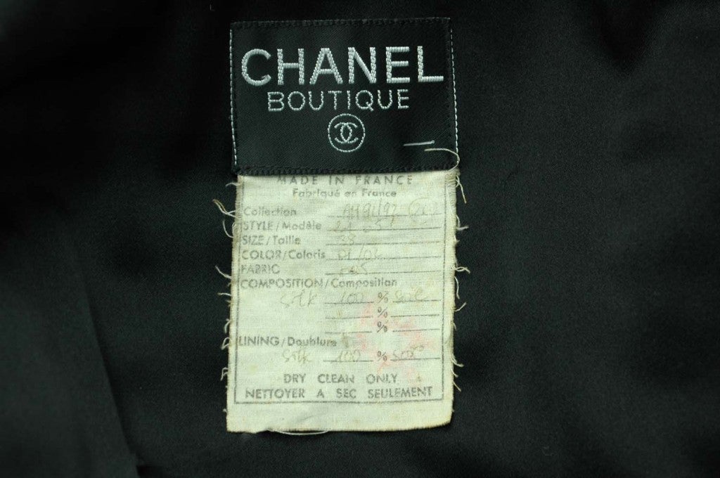 CHANEL Blue Quilted Puffer Jacket with Feather Trim 1