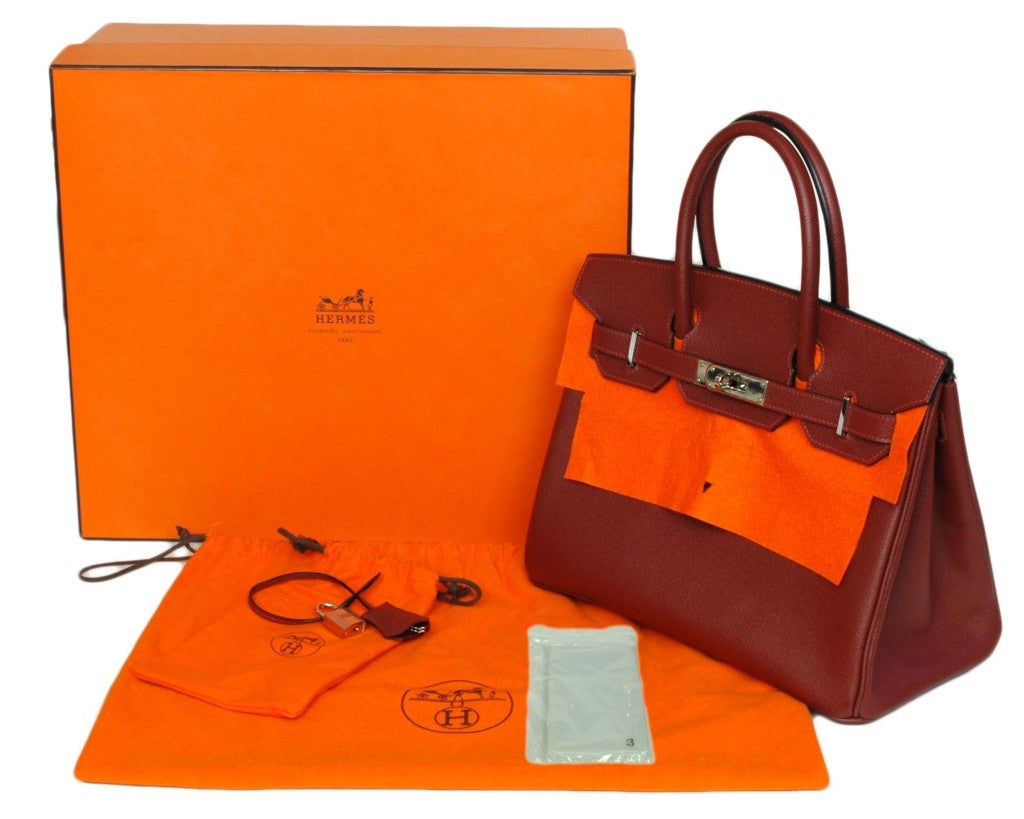 Hermes Rouge H Epsom Birkin With Palladium Hardware - 30 CM
Age: 2005
Made In France
Materials: Epsom Leather
Interior Has Slip Pocket and Zippered Pocket
Blind Stamp On The Back Of The Closure Reads: 