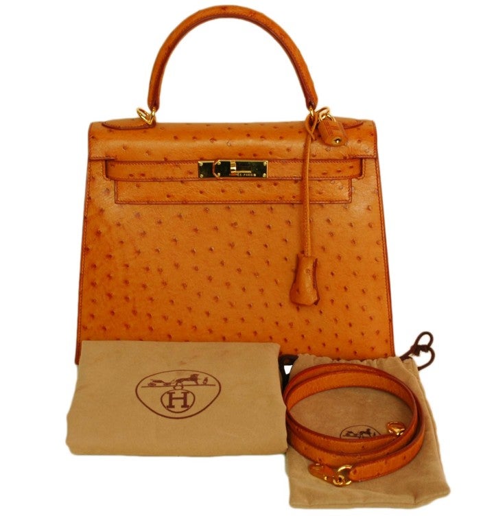 Hermes Cognac Ostrich Kelly 28cm
Age: 2000
Made In France
Materials: Ostrich leather with goldtone hardware
Stamped: 