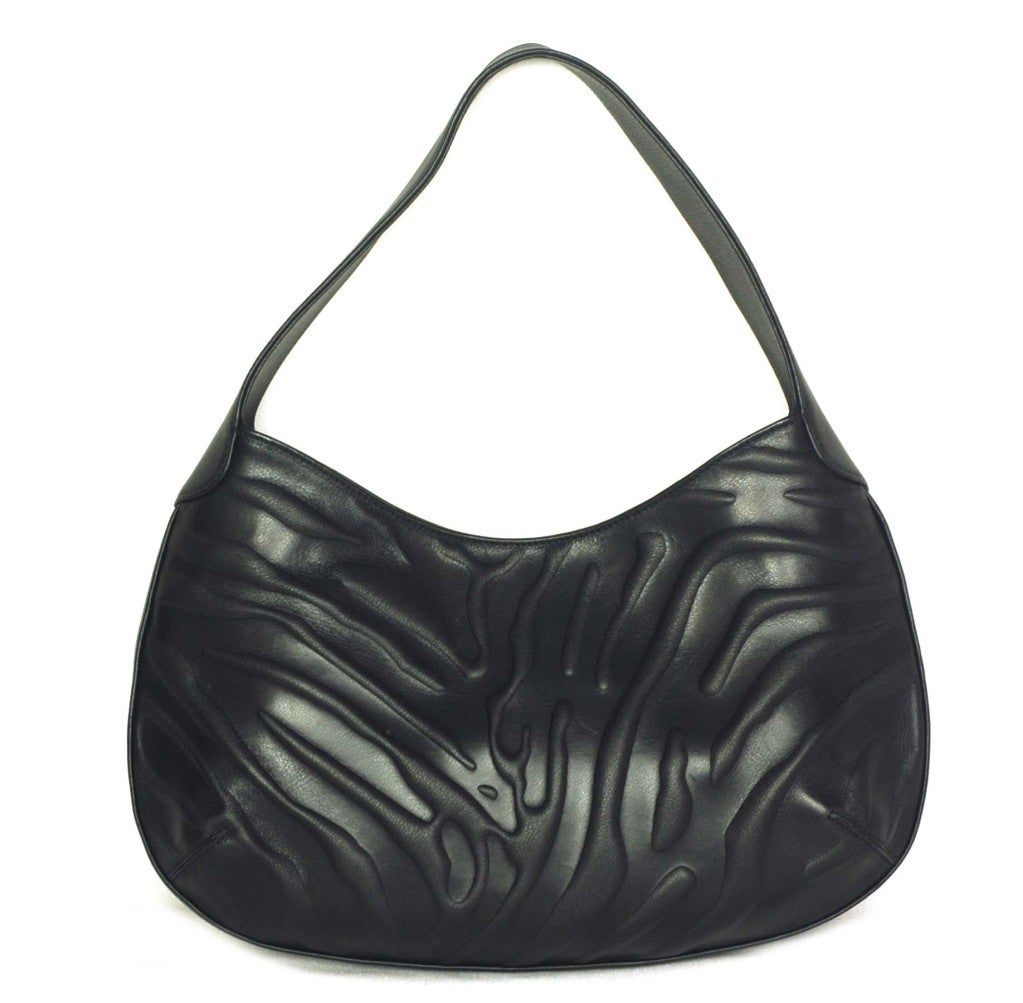 CARTIER Black Leather Hobo Bag with Panther rt. $1,510 at 1stdibs