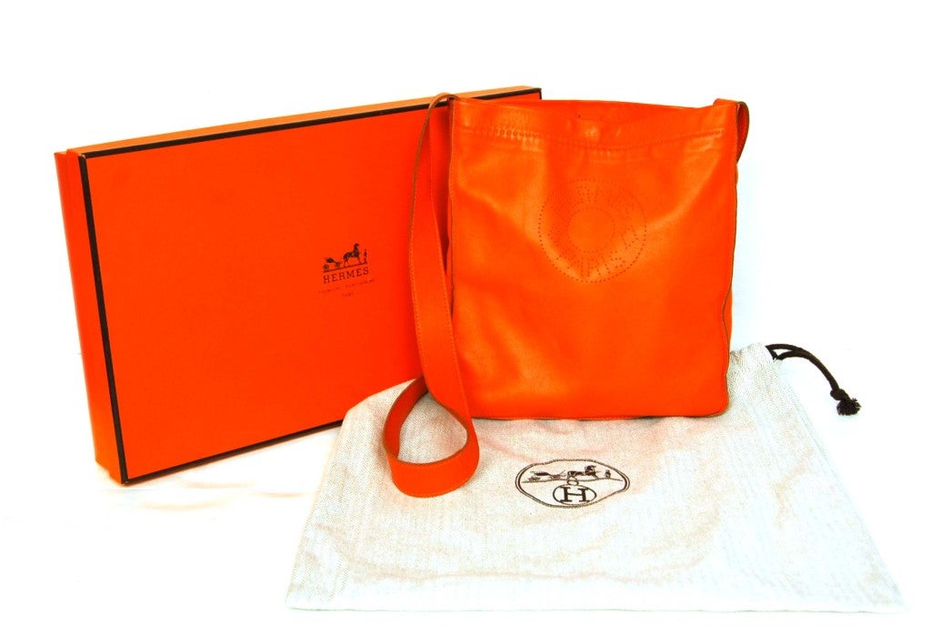 HERMES Orange Leather Perforated 'Clou De Selle' Crossbody Bag at 1stDibs