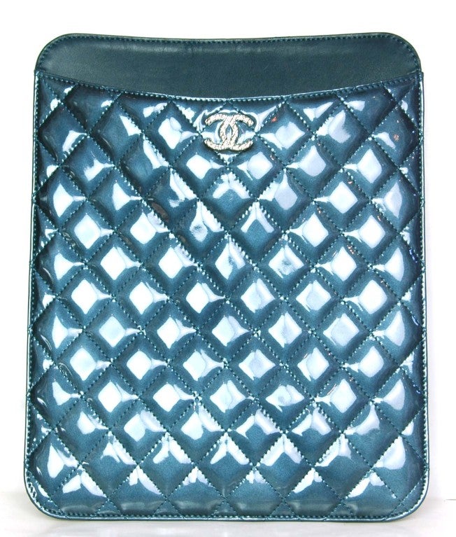 Chanel Blue Quilted Patent Ipad Case
Age: 2012
Made In Italy
Materials: Patent Leather
Features Silver Textured CC on Front Panel
Stamped: CHANEL MADE IN ITALY
Hologram Sticker Reads: 15091753

Comes With:


Chanel Care