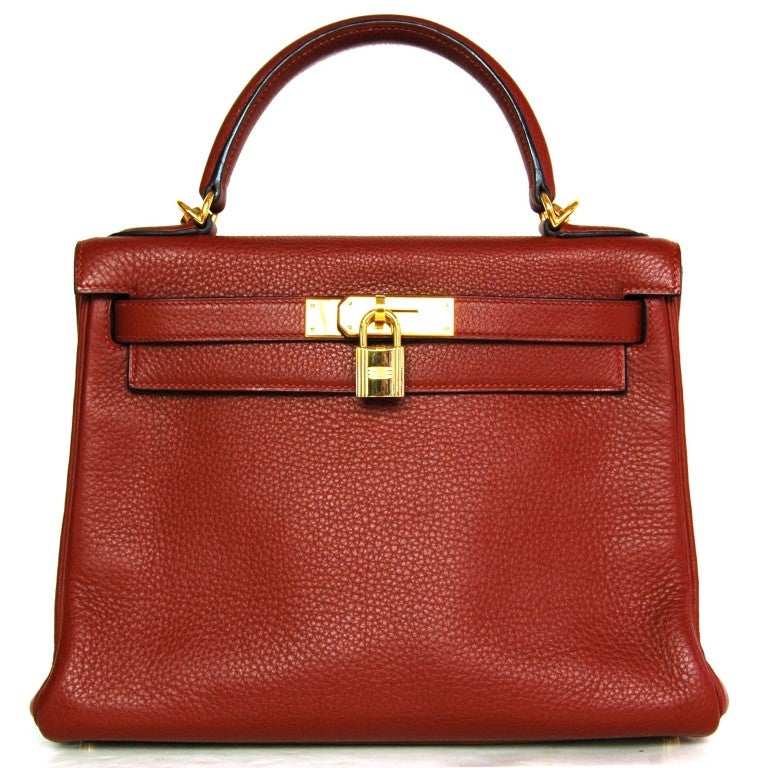 Hermes Red Rouge 28cm Kelly Bag with Shoulder Strap
Age: 2006
Made In France
Materials: Leather
Stamped: HERMES PARIS MADE IN FRANCE
Blind Stamp Reads: J

Comes With:
Shoulder Strap

Length: 11