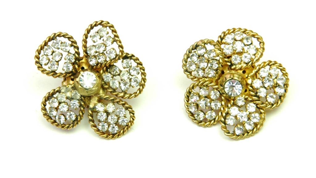 Chanel Vintage Flower Earrings with Rhinestones
Age: 1983
Made In France
Materials: Steel, Rhinestones
Stamped: CHANEL1983