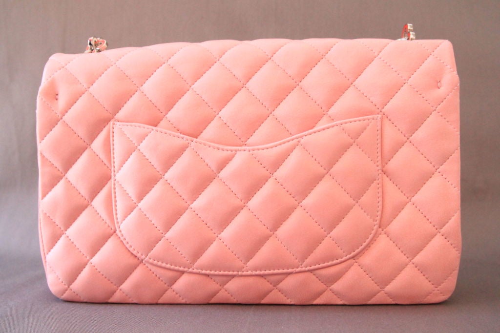 This stunning CHANEL Valentine Pink Lambskin Quilted 10