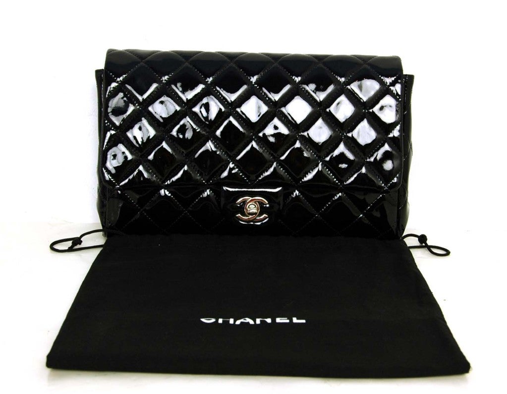 Chanel Black Patent Leather Shoulder Bag
Age: 2012
Made In Italy
Materials: Patent Leather
Stamped: CHANEL MADE IN ITALY
Hologram Sticker Reads: 15140695

Comes With:
Chanel Dust Bag

Length: 10.5