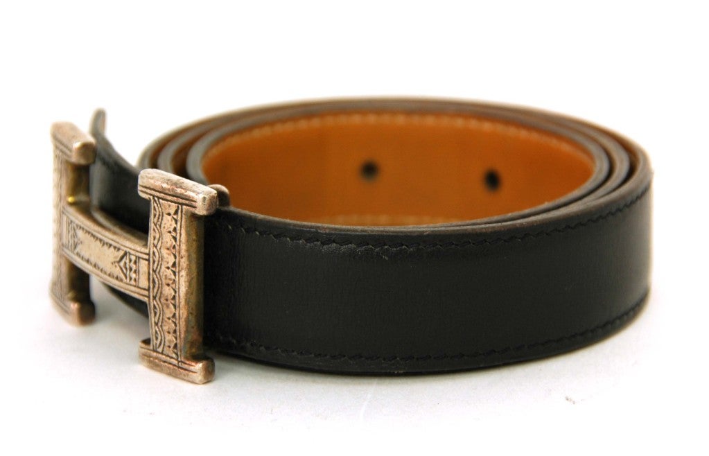 Hermes Black Touareg H Belt With Sterling Buckle -70 CM
Age: c. 1999
Made In France
Materials: Leather, Sterling Silver
Stamped As 90 CM But Actual Size is 70 CM
Stamped: 