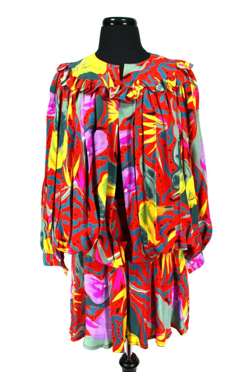 Ungaro vintage multi-color silk skirt suit. Silk skirt and matching silk long sleeve top.

Measurements:  Bust: 22