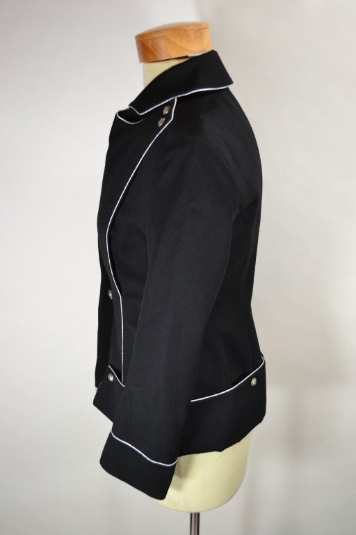 Beautiful black wool jacket with silver lining and buttons.