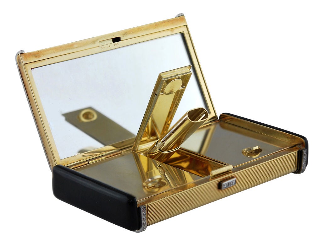 CARTIER  rare Art Deco diamond enamel gold compact.