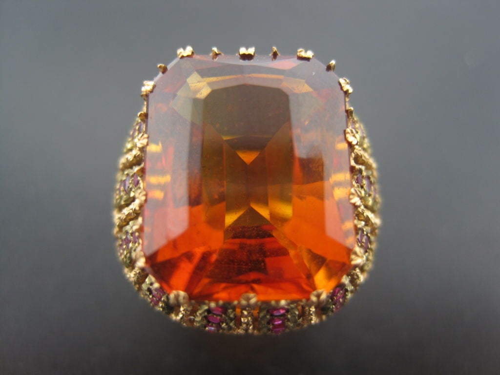 A superb  Imperial Citrine  weighing aprox 22 carats set on a ruby and gold ring by Buccellati. Circa 1950's.