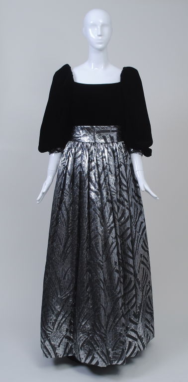 California designer Michael Novarese, who died in 2010, was best known for his extravagant evening creations for a wealthy and social clientele from the 1960s through his retirement in 1992. This gown, from the 980s, has a black velvet bodice and a