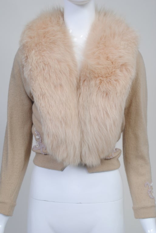 Decorated and fur-trimmed cardigans were extremely popular during the 1950s and '60s. The really great ones, mostly in cashmere, started with a basic cardigan that was refashioned into varied designs by shop, dressmaker or factory, and was either