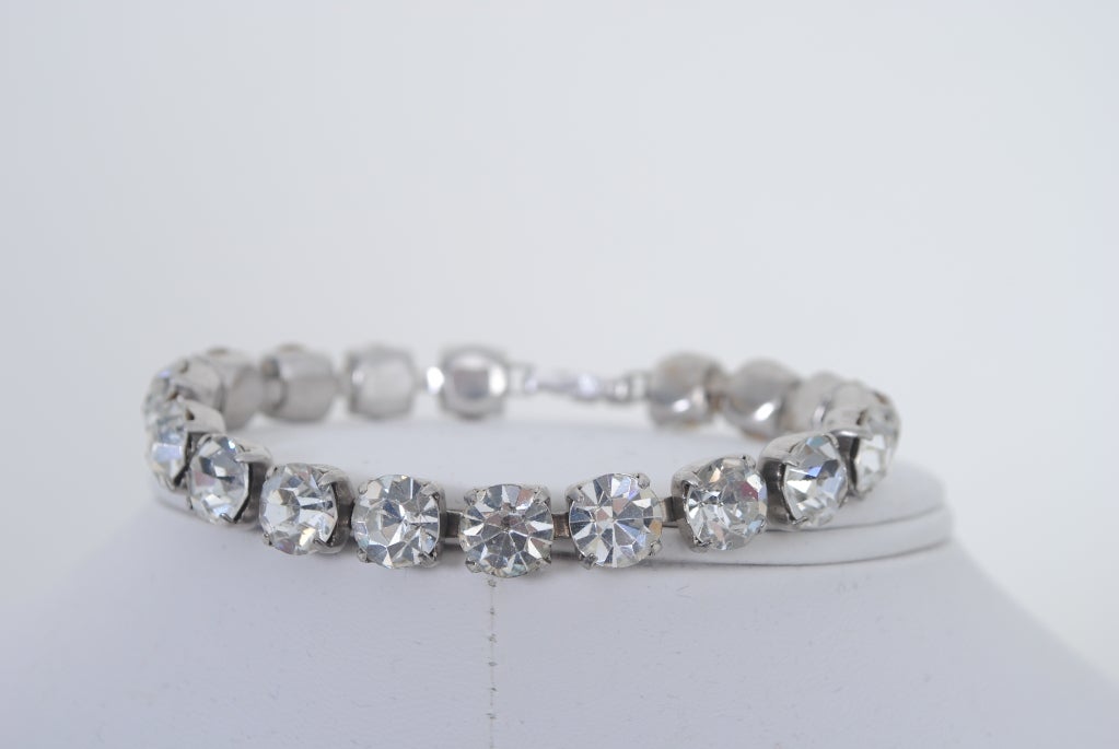 Weiss tennis bracelet of round clear crystals, nice sized stones.