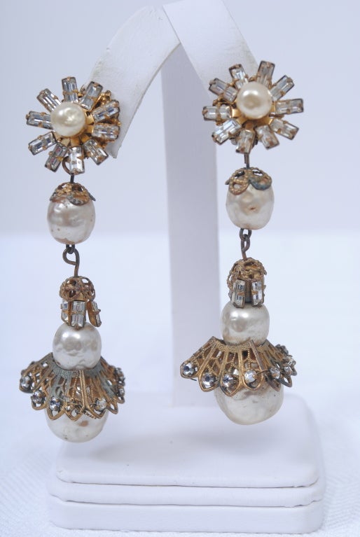 Miriam Haskell vintage drop earrings with her signature irregular pearls in varied shapes and sizes, filigree work, and rhinestones.