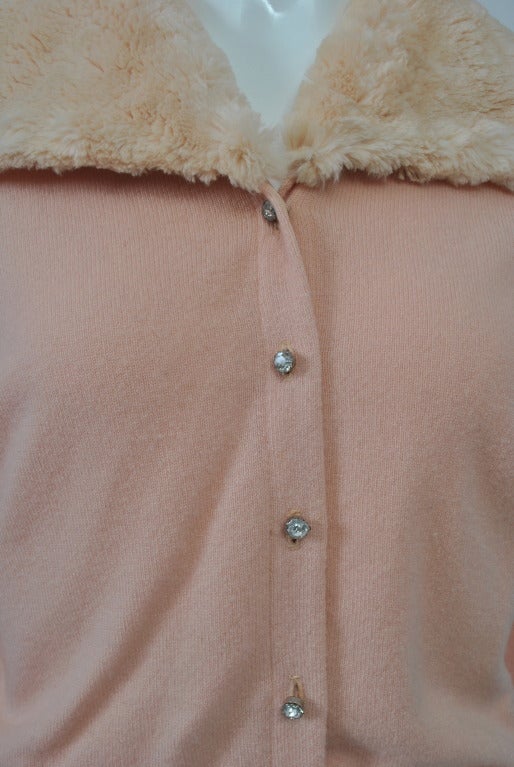 pink sweater with fur collar