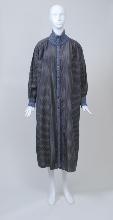 1980s Missoni oversized coat/dress in a beautiful striped silk fabric trimmed with coordinating tweed knit down the button front, around the cuffs and the mock T-neck collar. Light brown and blue collar combination, with dropped shoulders,  and