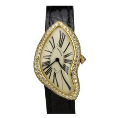 Montre-bracelet Cartier en or jaune et diamants pour femme:: circa 1991
